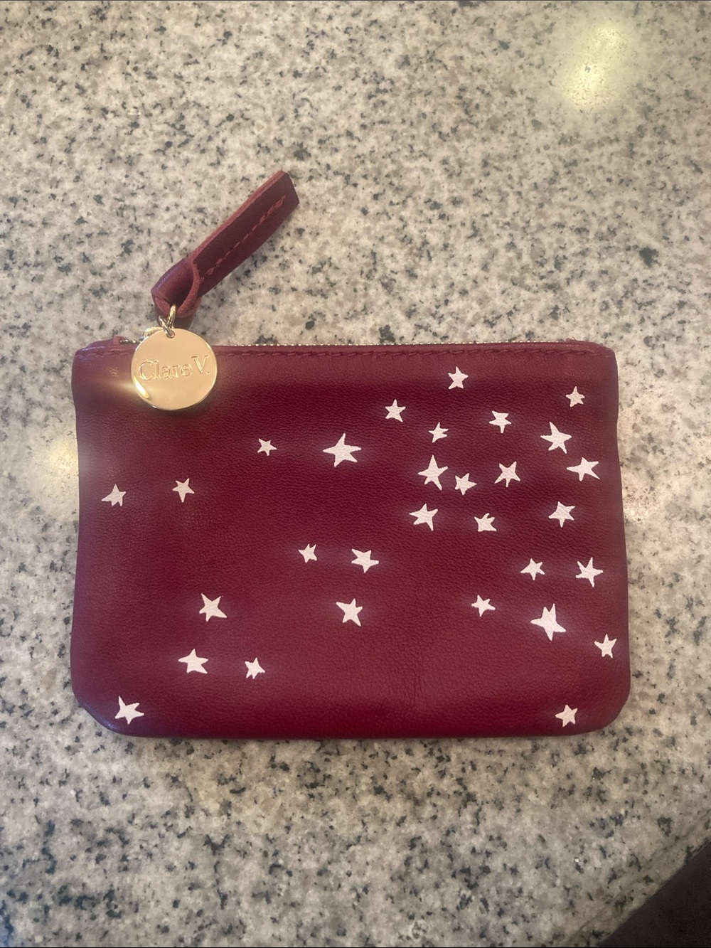 Clare V Maroon Leather Star Print pouch with Gold Charm